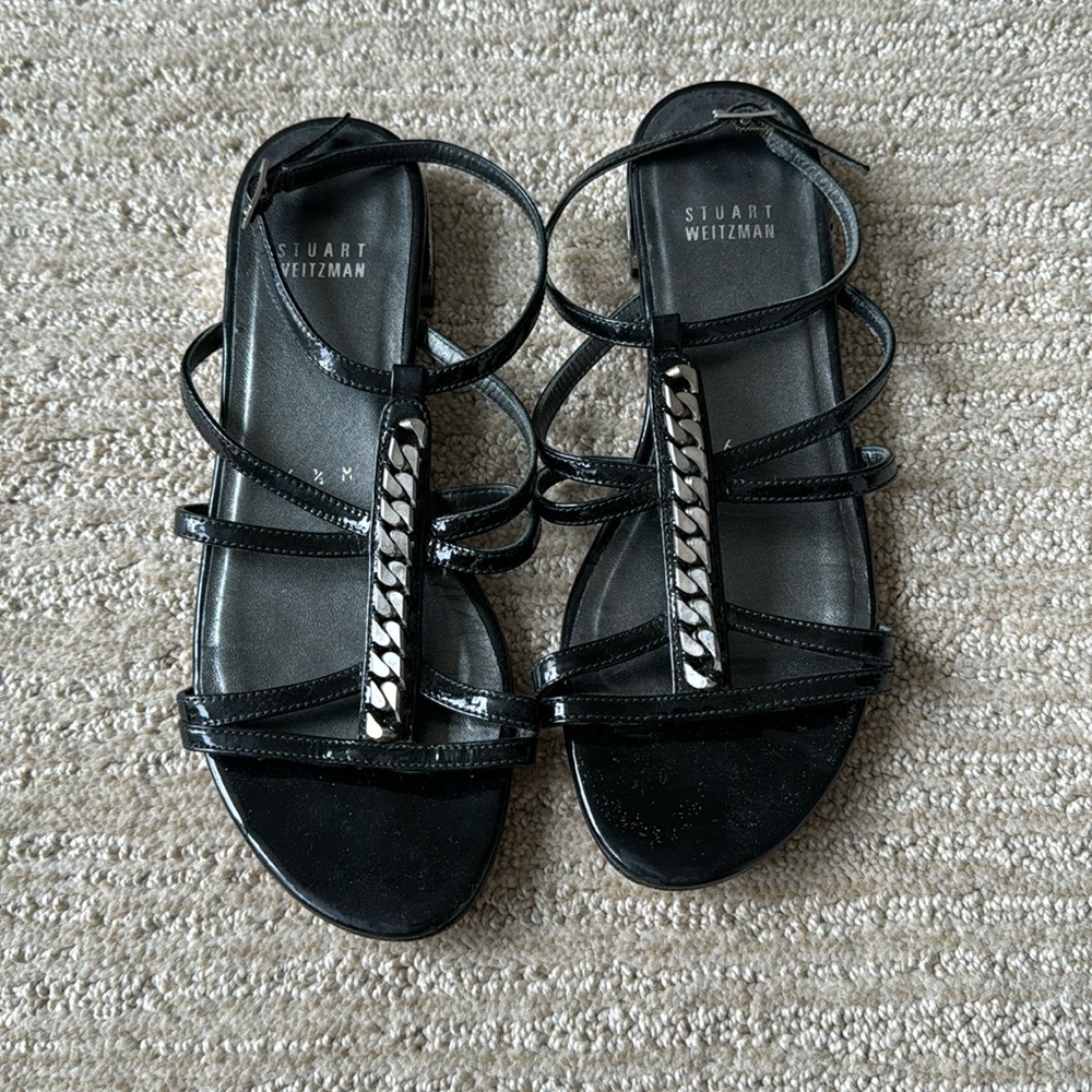 Black strappy sandal with metal detailing